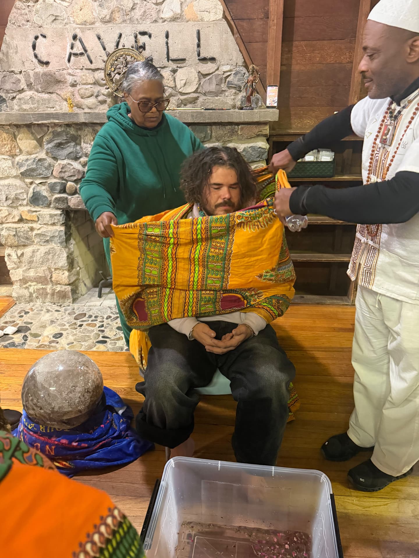 A moment from the SoulTribes ritual at Camp Cavell — the washing continues