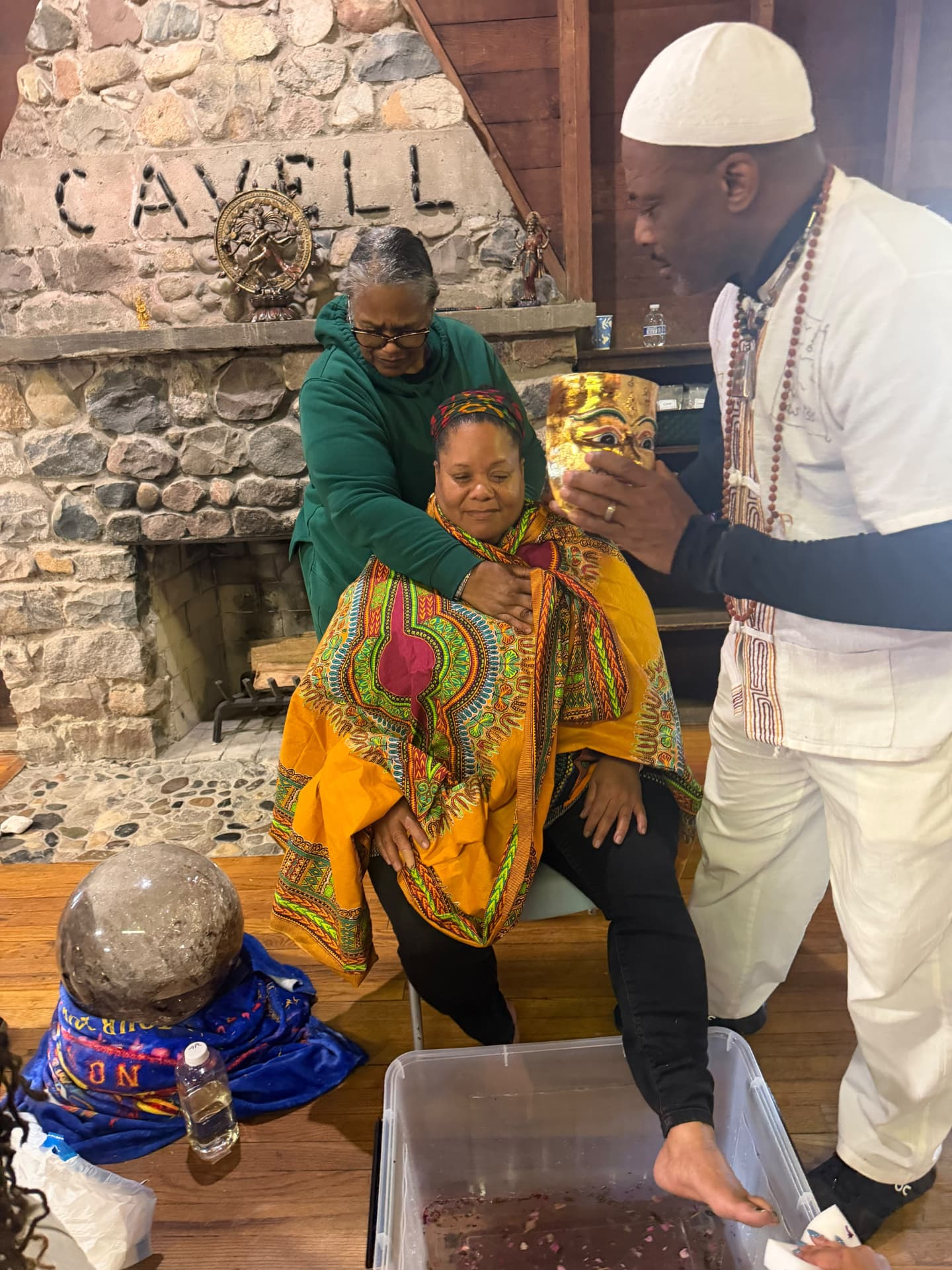 A moment from the SoulTribes ritual at Camp Cavell — water and petals