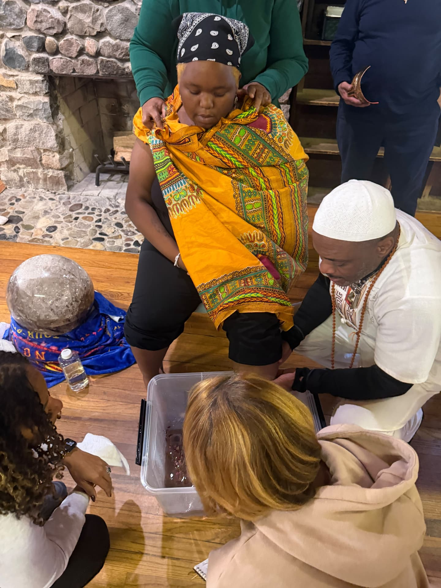 A moment from the SoulTribes ritual at Camp Cavell — blessed water